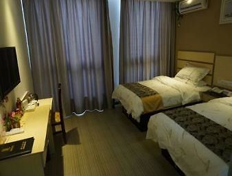 Super 8 Hotel Nantong Qidong Central Bus Station Værelse billede